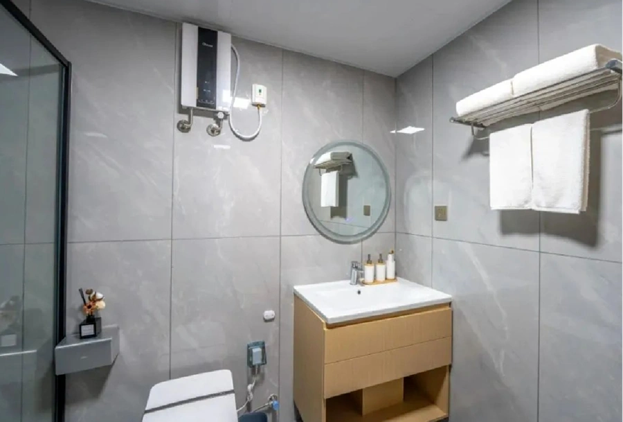 yantai-weiran-studio-apartments-modern-light-wood-wall-mounted-bathroom-vanity.webp